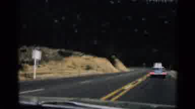 Colorado USA (1963): Group Of Car Slowly Drive And Enjoys Nature And Hills W Grey
