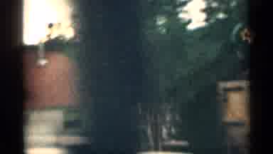 Colorado USA (1963): Man Being Filmed In Father Of Sod Chine Father On Moving Car