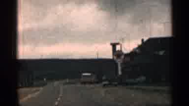 Colorado USA (1963): Passing White Trier Irked Rod Side And Grey Clouds