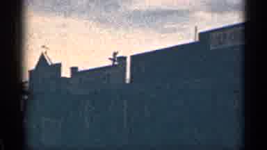 Colorado USA (1963): Old Western Style Buildings With The Sun Behind Them