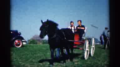 Montgomery Minnesota (1963): Two Men Ride In White Caring Dawn By Black Hothouse