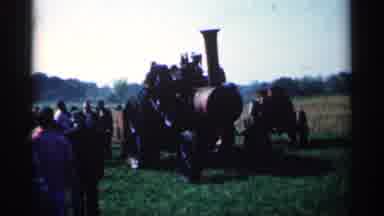 Montgomery Minnesota (1963): Man Showing Off His Arming Equipment To Group Of