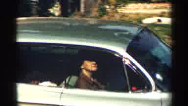 Texas USA (1963): Lady W Moving Round In Car And Bird W Pace To Check