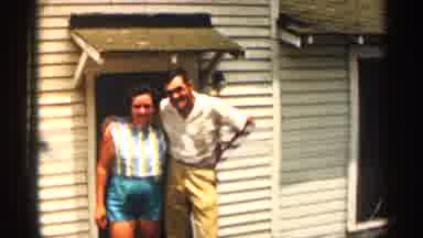 Texas USA (1963): Man Wearing Tn Slicks White Col Other Shirt Hugging Woman