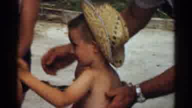 Texas USA (1963): Kid Going Up To His Sister To Hug And Kiss Her