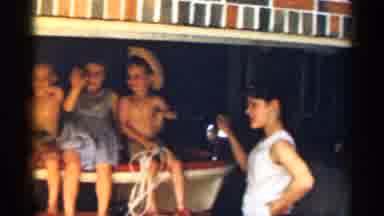 Texas USA (1963): Children Playing Other Seemingly Waving At Comer Surrounded By
