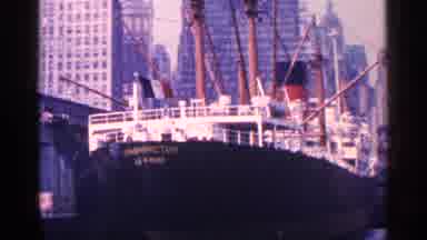 New York City (1964): Black Ship And Empire State Building On Cloudy Day