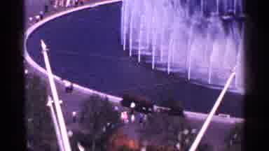 New York City (1964): Large Fountain Cars Rowdy Street View Daytime Outside Blue