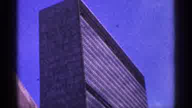 New York City (1964): Very Tall Building And Man Posing Father Photo At Bottom