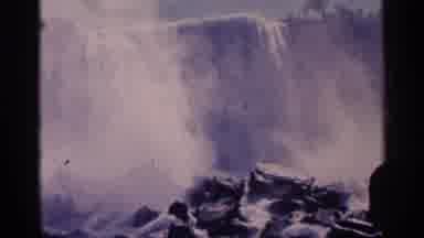 Niagra Falls Canada-1964: Person With Hood Watching Large Waterfall With Mist