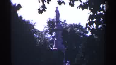 Pennsylvania (1964): Tall Statue In Middle Of Park Surrounded By Trees And Big