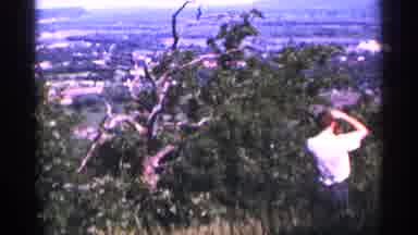 Duluth Minnesota (1965): Man Water Threw Grass While Taking Time So Enjoy His His