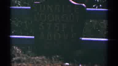 Duluth Minnesota (1965): Sign On Fence About Sunrise And Car Driving Off On Rod