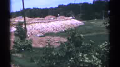 Duluth Minnesota (1965): Levee Built Next To Grassy Field And Trees