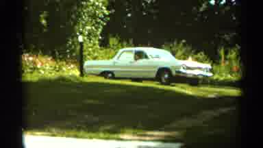 Duluth Minnesota (1965): Car Driving Through The Parking Spot