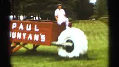 Duluth Minnesota (1965): Woman Wearing White Shirt Climbs Out Of Pu Bunyan