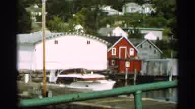 Duluth Minnesota (1965): Speed Boat Jets Cross And Open Body Of Water When Docked