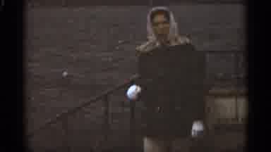 Duluth Minnesota (1965): Lady With Scarf On Her Head And Gloves On Berg On Water