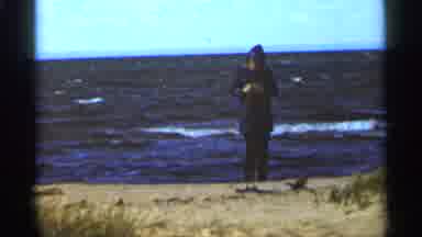 Duluth Minnesota (1965): Person Observes Windy Day On Beach