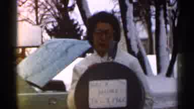 Eau Claire Wisconsin (1966): Lady Who Is In Snow And Writes On Her Christmas Of