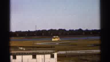Florida USA (1966): Red And White Car Driving On Racetrack Vol Daytime Outdo