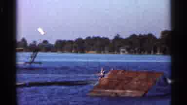 Florida USA (1966): Three People Jet Skiing In Like Going Over Mp Simultaneously