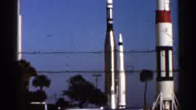 Florida USA (1966): Three Rocket Like Structures Blue Sky Background Sign Ares