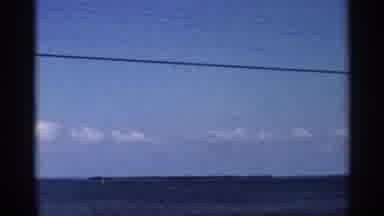 Florida USA (1966): Landscapes Of Blue Skies With Few Clouds And A Ocean With Boat