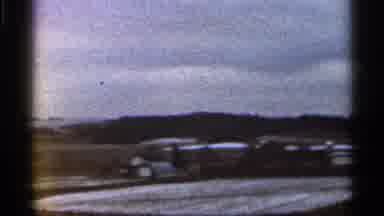Georgia USA (1966): Hills With People And Vehicles On Ground