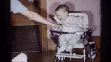 New York (1955): Baby In High Che With Cake In Father
