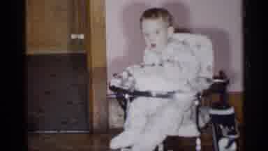 New York (1955): Adult Wipes Off Food With Babysitting