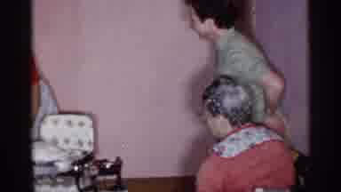 New York (1955): Women In Room And One Woman Holding Varying Baby With Only Dipper