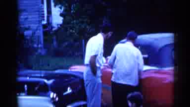 New York (1955): Two Guys Having Discussion In Father Of Time Car