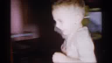 New York (1955): Toddler Boy Wearing Striped Shirt And Grandmother Overfills
