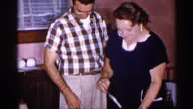 New York (1955): Toddler Fascinated By Mir's Finishing Touches On His Birthday
