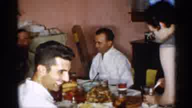 New York (1955): Bunch Of Men And Baby In High Chair Preparing Father Mel