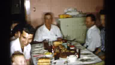 New York (1955): Family Around Table Eating And Chatting With Each Other