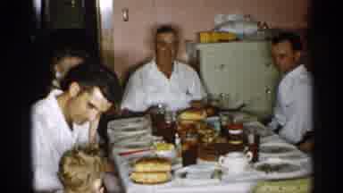 New York (1955): Family Having Food Round Dinner Table Talking To Kids Laughing