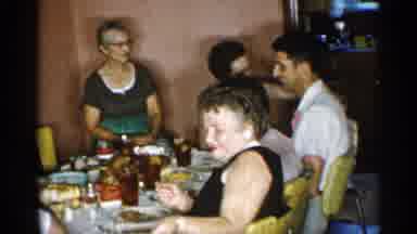 New York (1955): Large Family Greg At Dinner Table Sharing Food
