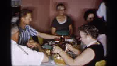 New York (1955): Large Family Sitting At Table And Sitting To Serve Thanksgiving