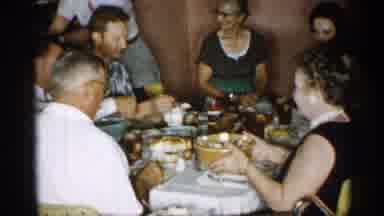 New York (1955): Family Sitting Around Table Eating Dinner And Celebrating Special