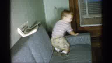 New York (1955): Little Boy With At Shirt Is Crawling On Light Blue Of And He