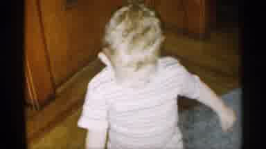 New York (1955): Boy With Stripy Top Is Running Round In House Very Cheerfully