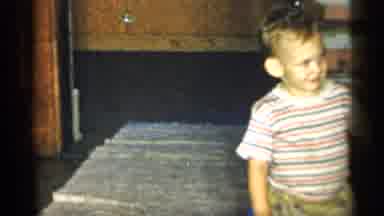 New York (1955): Little Boy Walking Round Living Room With Big Smile On His Face