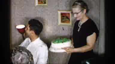 New York (1955): Serving Large White Cake To Dinner Table Father Family