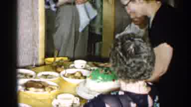 New York (1955): Woman Wearing Black Dress Serves Green And Whitehorse Cake At