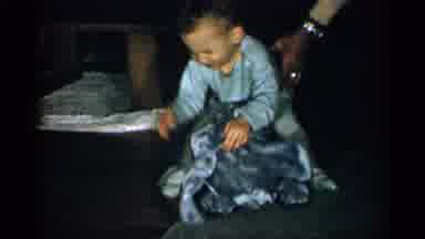 New York (1955): Kid Playing With Toy And Crawling Round