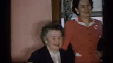 New York (1955): Women Smiling S A Oversize Cot Is Put On Child