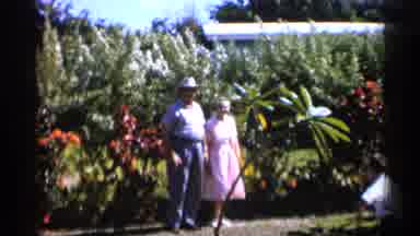 Alabama (1958): Two People Standing Out Inn Garden Posing Father Caricature