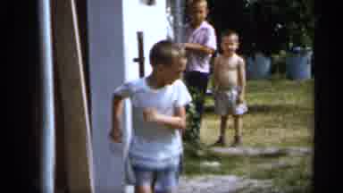 Florida (1958): Boy Wearing White Shirt Runs Towed Comer On Sunny Day